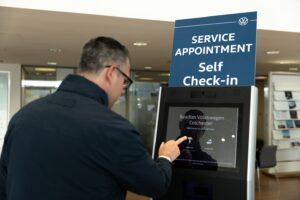 Volkswagen introduces airport-style digital check-in kiosks to boost convenience at UK dealers