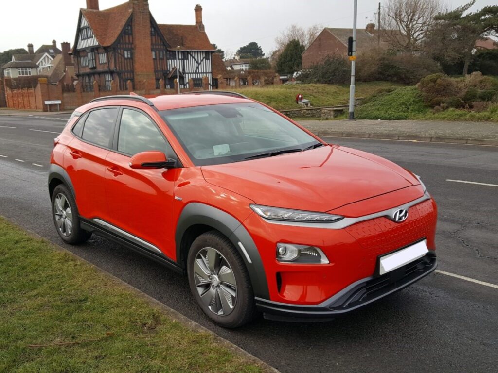 A red Hyundai Kona Electric Premium SE 64kWh