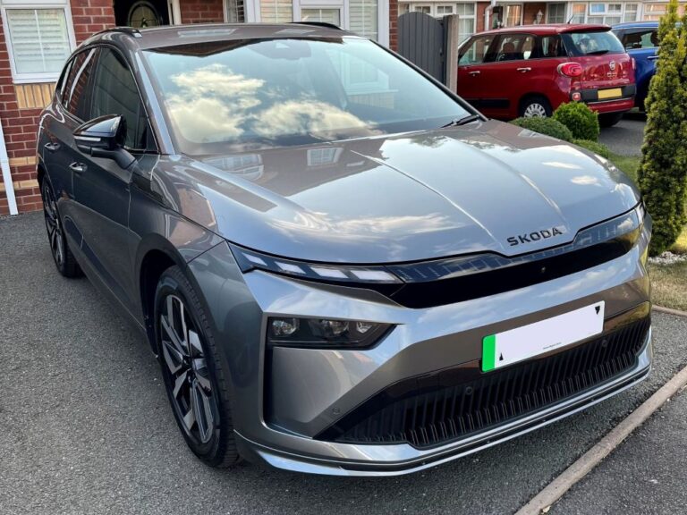 Grey Skoda Enyaq 85 on owners driveway