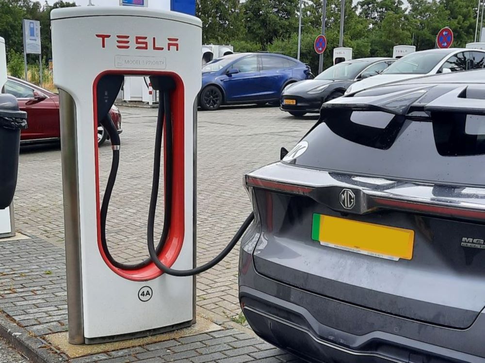 MG4 EV charging at a Tesla Supercharger 