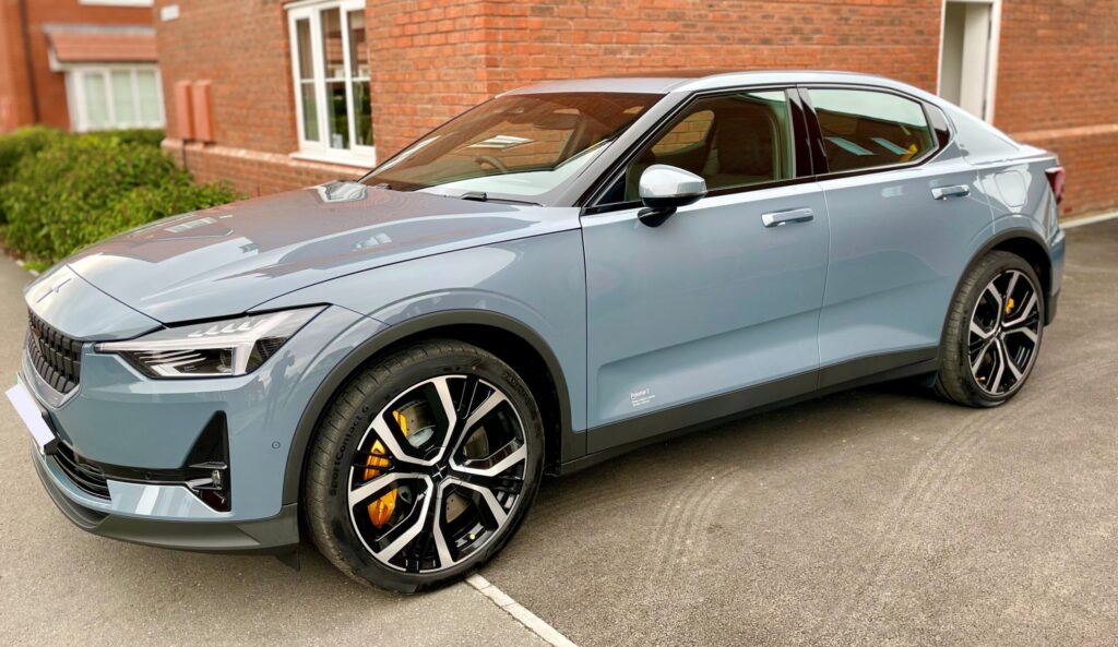 Polestar 2 parked on owner's driveway looking clean