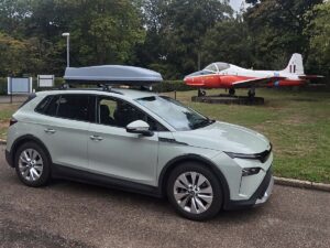 Andrew's Skoda Elroq parked near to a plane.