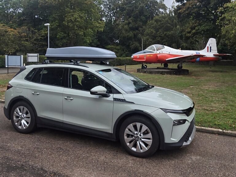 Andrew's Skoda Elroq parked near to a plane.