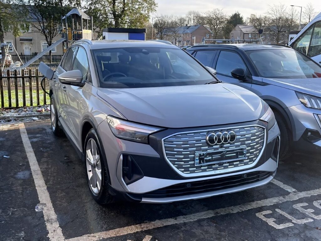 Grey 2022 Audi Q4 e-tron 40 S line 82kWh parked in a UK electric vehicle bay - Owner Review