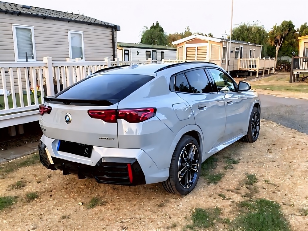 A rear view of Ian Sanford's 2026 BMW iX2 65 kWh