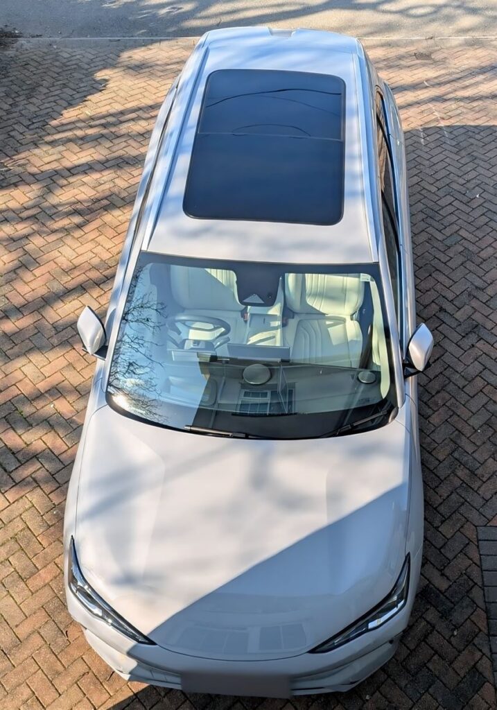 An aerial view of Shaun J's 2025 Geely EX5 Max parked on his driveway