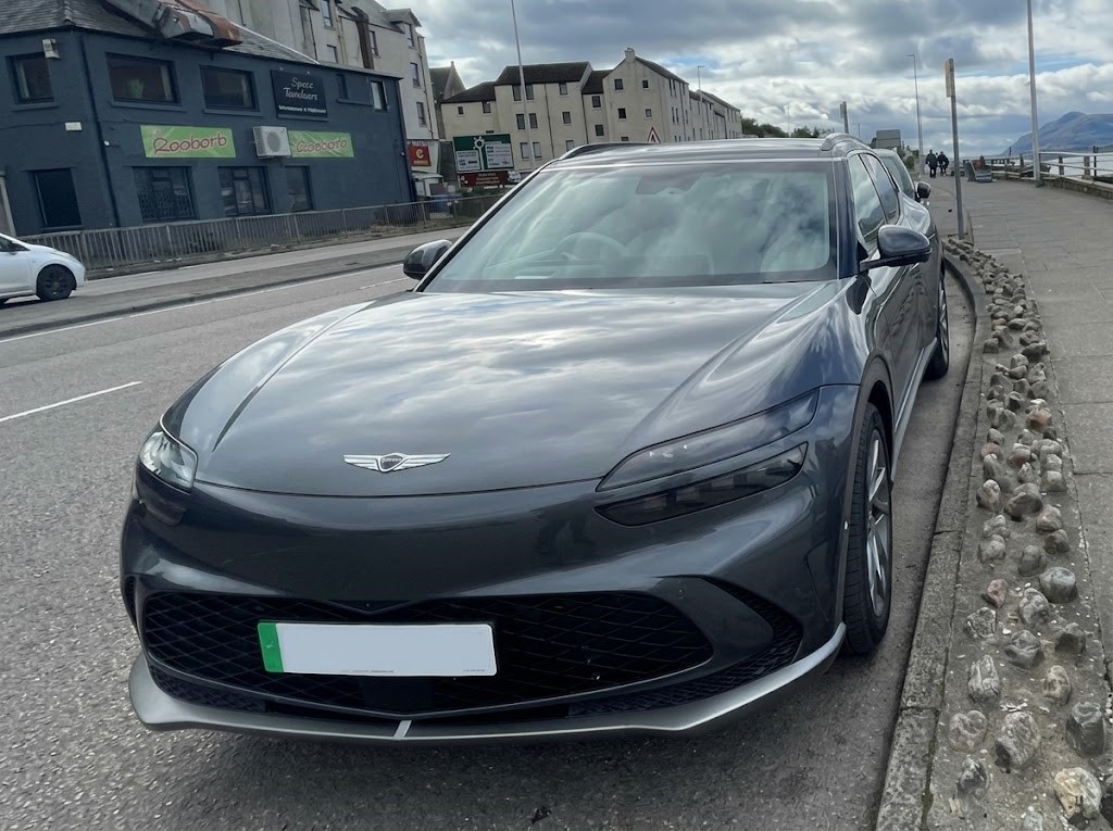 Genesis GV60 Sport parked on a roadside
