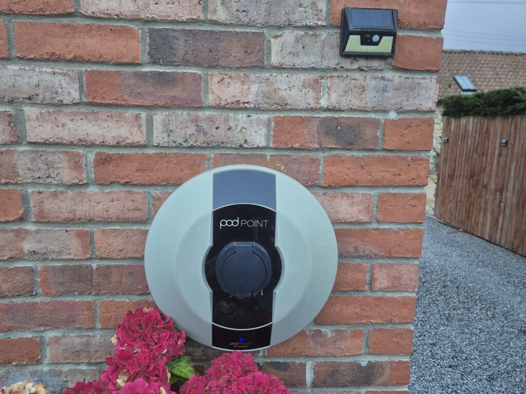 York Happy Kia driver's Pod Point charging unit