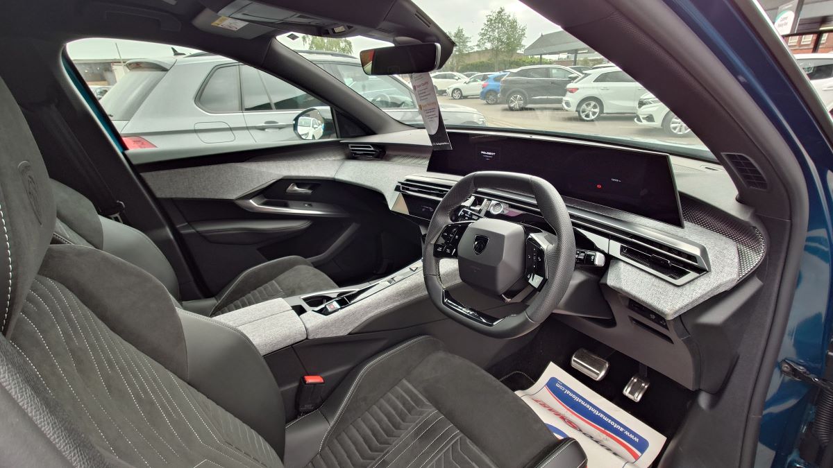 The front seats and dashboard of Nigel Willis's Peugeot E-3008