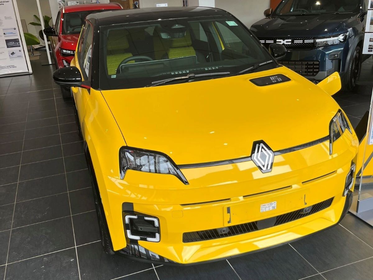 A Renault 5 E-Tech in a Renault dealership