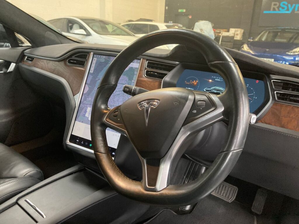 The dual screens and steering wheel of Graham's 2017 Tesla Model S 100kWh