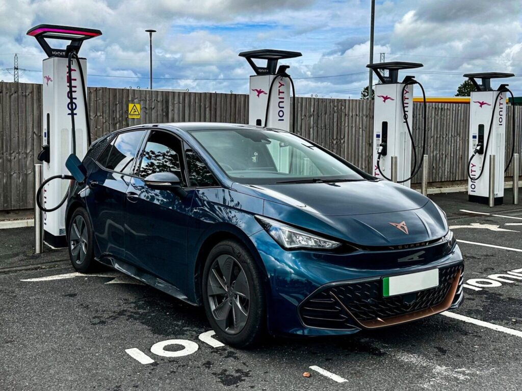 A Cupra Born charging at an IONITY station